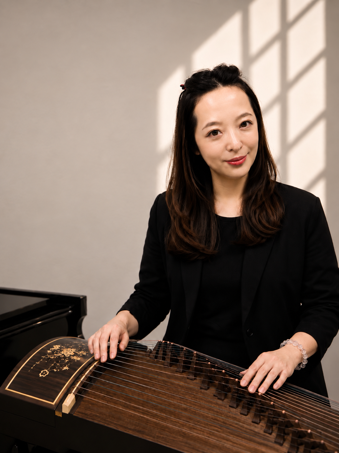 李倩宜,主修鋼琴、古箏
